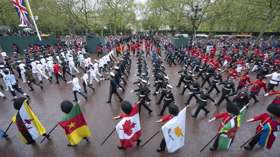 LONDON, UNITED KINGDOM - MAY 06: Troops march within Coronation Procession from Westminster Abbey to Buckingham Palace following the coronation of King Charles III and Queen Camilla in London, United Kingdom on May 06, 2023.