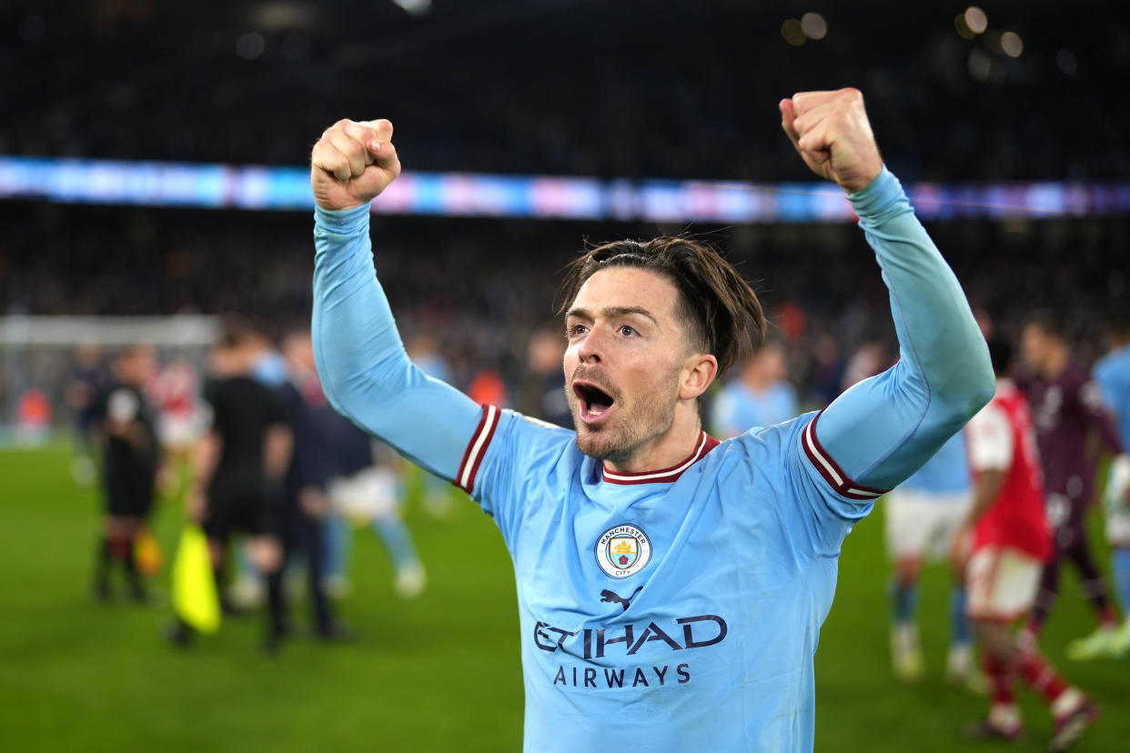 Manchester City's Jack Grealish celebrates with the fans after their English Premier League win over Arsenal. 