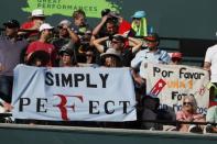 Mar 24, 2018; Key Biscayne, FL, USA; Fans hold a banner in the stands between games during the match between Thanasi Kokkinakis of Australia and Roger Federer of Switzerland (both not pictured) on day five of the Miami Open at Tennis Center at Crandon Park. Kokkinakis won 3-6, 6-3, 7-6(4). Mandatory Credit: Geoff Burke-USA TODAY Sports