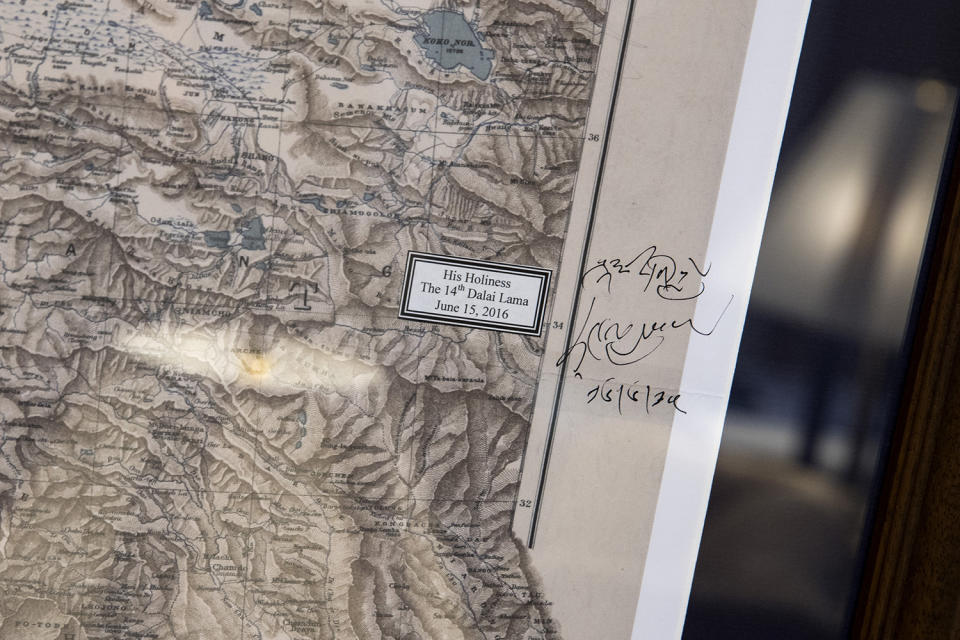 Gadhafi, Netanyahu, the Dalai Lama, all signed this Congressman’s maps