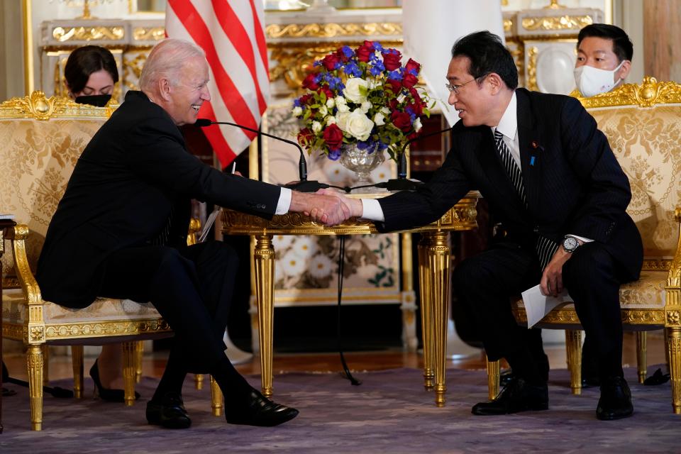 President Joe Biden shakes hands with Japanese Prime Minister Fumio Kishida during a bilateral meeting at Akasaka Palace, Monday, May 23, 2022, in Tokyo.