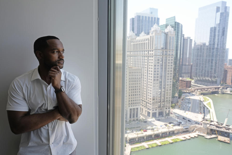 Adrian Perkins stands for a portrait in his office in Chicago, Thursday, June 13, 2024. (AP Photo/Nam Y. Huh)