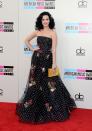 <p>A polka dot and floral gown is a lot of print to pull off but somehow Katy made it work. [Photo: Getty] </p>