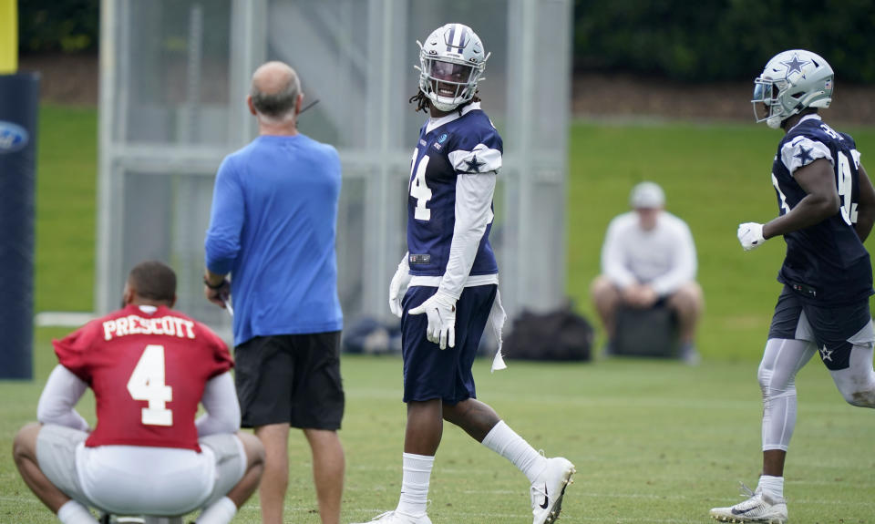 Dallas Cowboys defensive end Randy Gregory (94) walks the field during an NFL football team practice Wednesday, June 9, 2021, in Frisco, Texas. Gregory isn't ashamed of a suspension-filled past that nearly derailed his NFL career, just maybe a little tired of it being the focus of his story. (AP Photo/LM Otero)