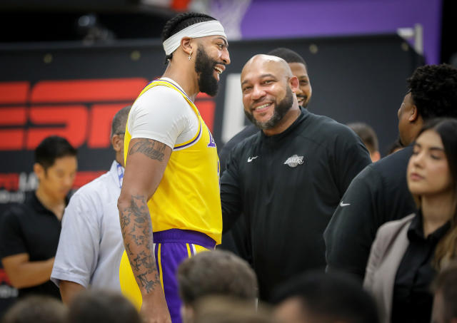 Los Angeles Lakers forward Anthony Davis and head coach Darvin Ham chat during Lakers media day at UCLA Health Training Center in El Segundo, California, on Sept. 26, 2022. (Christina House / Los Angeles Times via Getty Images)