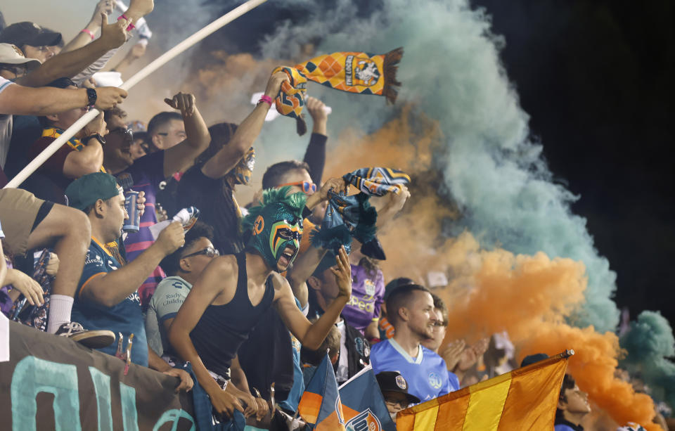 Fans cheer on the San Diego Loyal during a USL soccer match against Phoenix Rising FC on Sunday, Oct. 22, 2023, in San Diego. (K.C. Alfred/The San Diego Union-Tribune via AP)