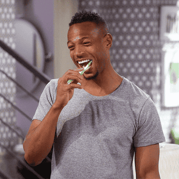 Marlon Wayans brushes his teeth in "Marlon"