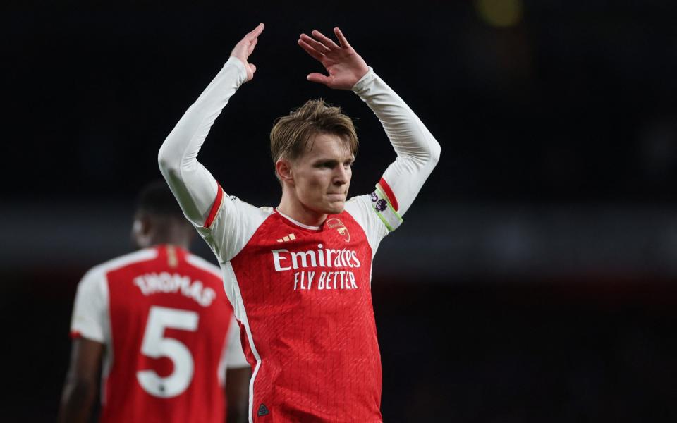 Soccer Football - Premier League - Arsenal v Luton Town - Emirates Stadium, London, Britain - April 3, 2024 Arsenal's Martin Odegaard celebrates scoring their first goal