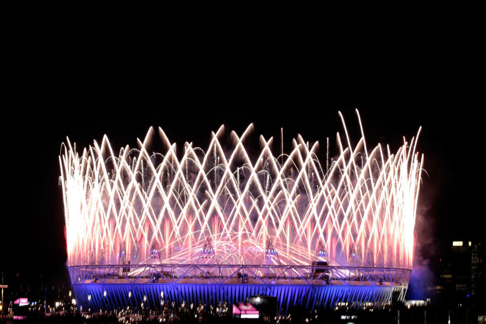 LONDON, ENGLAND - JULY 27: Fireworks go off over the Olympic Stadium during the Opening Ceremony of the London 2012 Olympic Games at the Olympic Stadium on July 27, 2012 in London, England. (Photo by Adam Pretty/Getty Images)