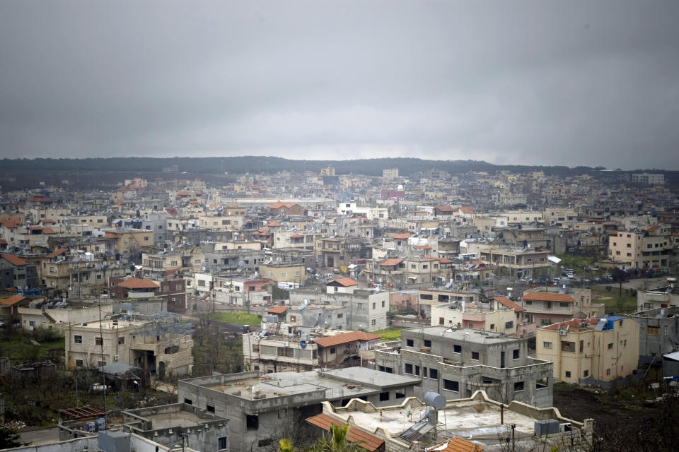 FILE - This April 5, 2011, file photo, shows a view of the village of Bukata in the Golan Heights, an area Israel captured from Syria in the 1967 Middle East War. Israel has built dozens of settlements in the Golan over the years, with an estimated 26,000 Jewish settlers living there as of 2019. Roughly the same number of Arabs live in the area, most of them members of the Druze sect. (AP Photo/Ariel Schalit, File)