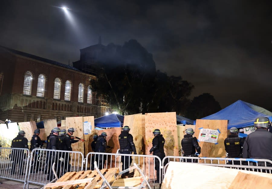 California Highway Patrol (CHP) officers clear a pro-Palestinian encampment after a dispersal order was given at the University of California, Los Angeles (UCLA) campus, on May 2, 2024 in Los Angeles, California. (Photo by Mario Tama/Getty Images)