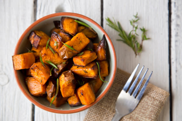 <p>One medium sweet potato contains 11 percent of the daily recommended amount of potassium, an electrolyte most Americans skimp on. That lack of potassium, especially paired with the overload of sodium in a lot of American diets, may eventually lead to high blood pressure. </p><p>Swap in sweet potatoes as a side dish and cut them into <a href="http://www.michelledudash.com/2016/11/29/baked-sweet-potato-fries-with-garlicky-greek-yogurt-dip/" rel="nofollow noopener" target="_blank" data-ylk="slk:sweet potato fries;elm:context_link;itc:0;sec:content-canvas" class="link ">sweet potato fries</a>.</p>
