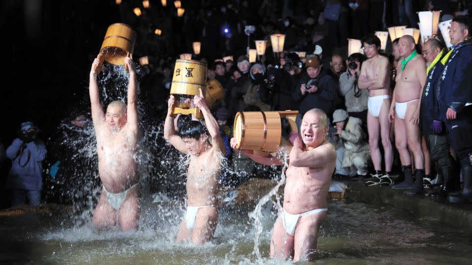 Participants wearing only "Fundoshi" loincloths at the Somin-sai festival at Kokusekiji Temple in Iwate prefecture, Japan, on February 17, 2024. - The Asahi Shimbun/Getty Images