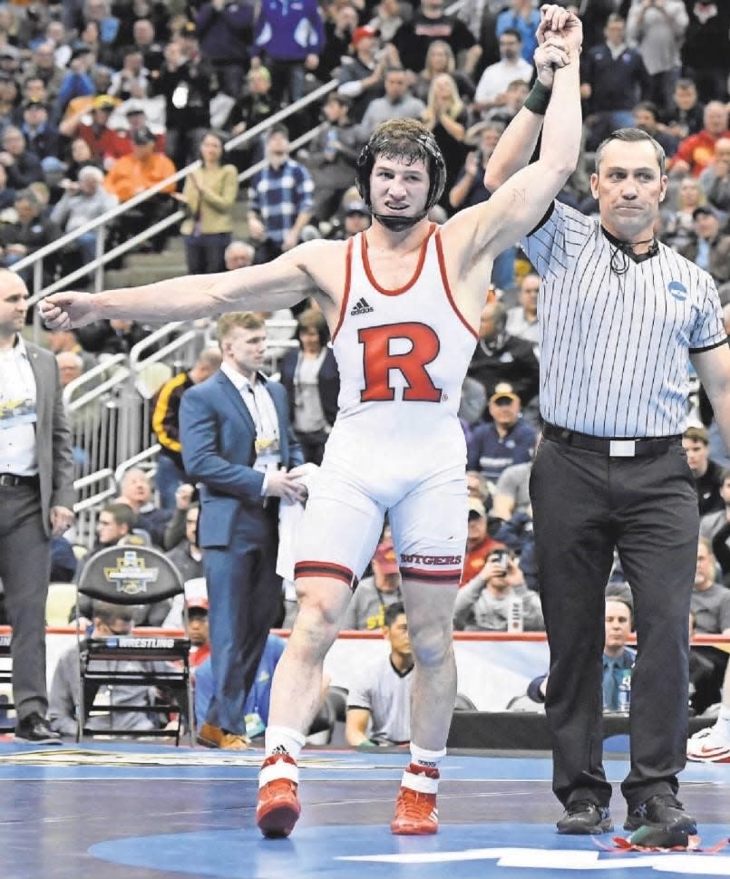 Rutgers wrestler Anthony Ashnault got his arm lifted in victory after winning NCAA Wrestling Championships at PPG Paints Arena in Pittsburg.