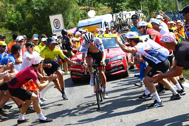 <span class="article__caption">Fans cheer Pogacar on the Hautacam.</span> (Photo: Tim de Waele/Getty Images)