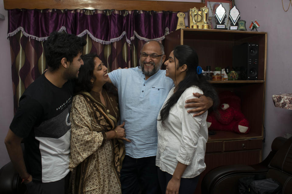 Associated Press photographer Channi Anand celebrates with his family Tuesday, April 5, 2020, following the announcement that he was one of three AP photographers who won the Pulitzer Prize in Feature Photography for their coverage of the conflict in Kashmir and in Jammu, India. (AP Photo)