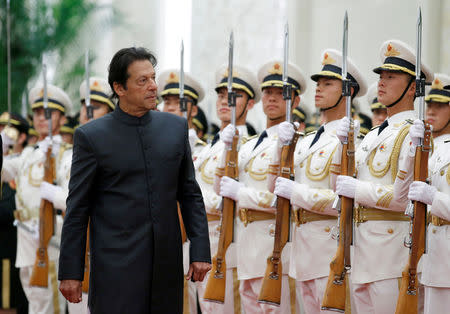 FILE PHOTO: Pakistani Prime Minister Imran Khan attends a welcome ceremony hosted by China's Premier Li Keqiang at the Great Hall of the People in Beijing, China, November 3, 2018. REUTERS/Jason Lee/File Photo