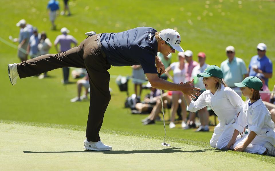 AUGUSTA, GEORGIA - APRIL 10: Charley Hoffman of the United States reacts with daughters Claire and Katelynn during the Par 3 Contest prior to the Masters at Augusta National Golf Club on April 10, 2019 in Augusta, Georgia. (Photo by Kevin C. Cox/Getty Images)