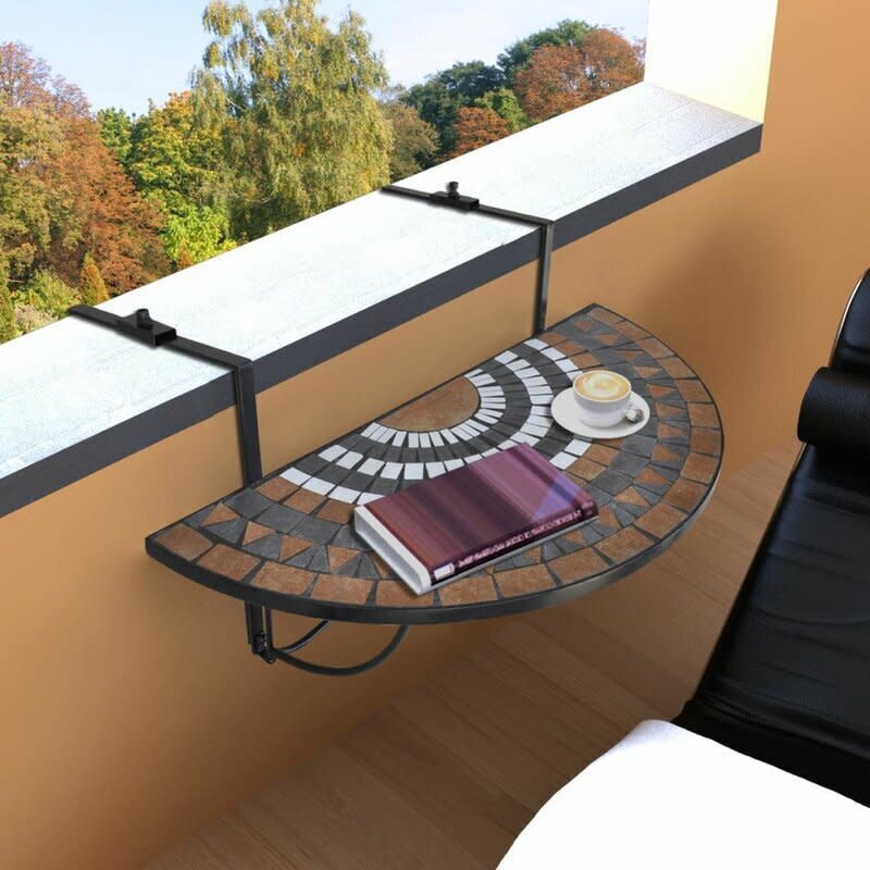 If you've got a tiny outdoor space, this table can be attached to any deck or balcony and folded up when the workday's over. And the design is easy on the eyes, too. <a href="https://fave.co/2yrpjGw" target="_blank" rel="noopener noreferrer">Find it for $82 at Wayfair</a>. 