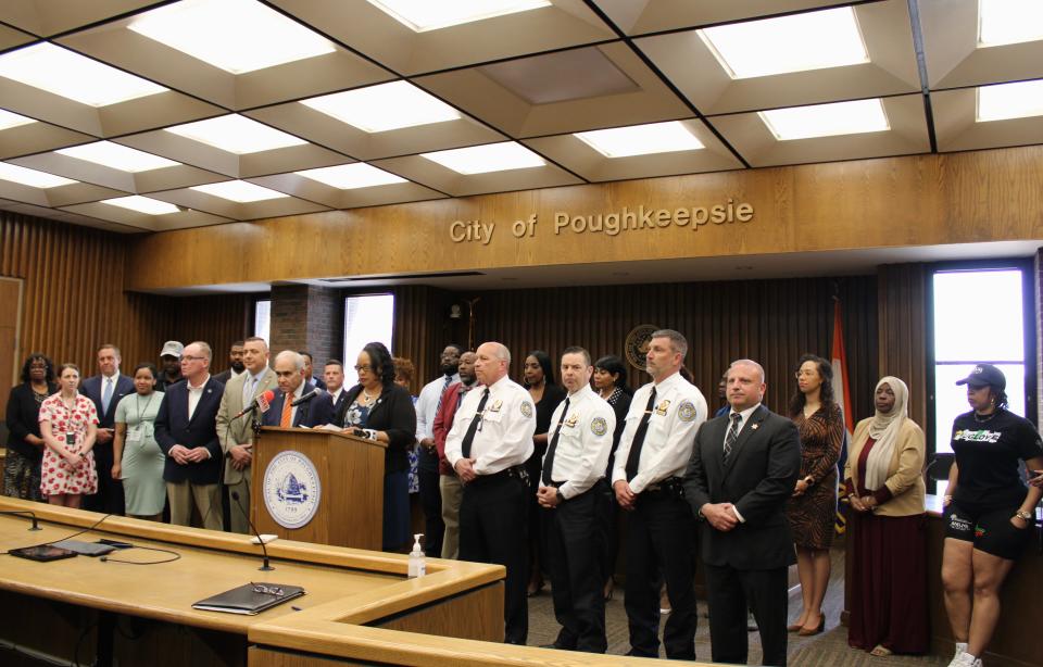 Poughkeepsie Mayor Yvonne Flowers, at podium, gathered a group of community members, elected officials and law enforcement Thursday, May 2, 2024 at the Poughkeepsie City Hall Common Council Chambers in response to a shooting in the City of Poughkeepsie.