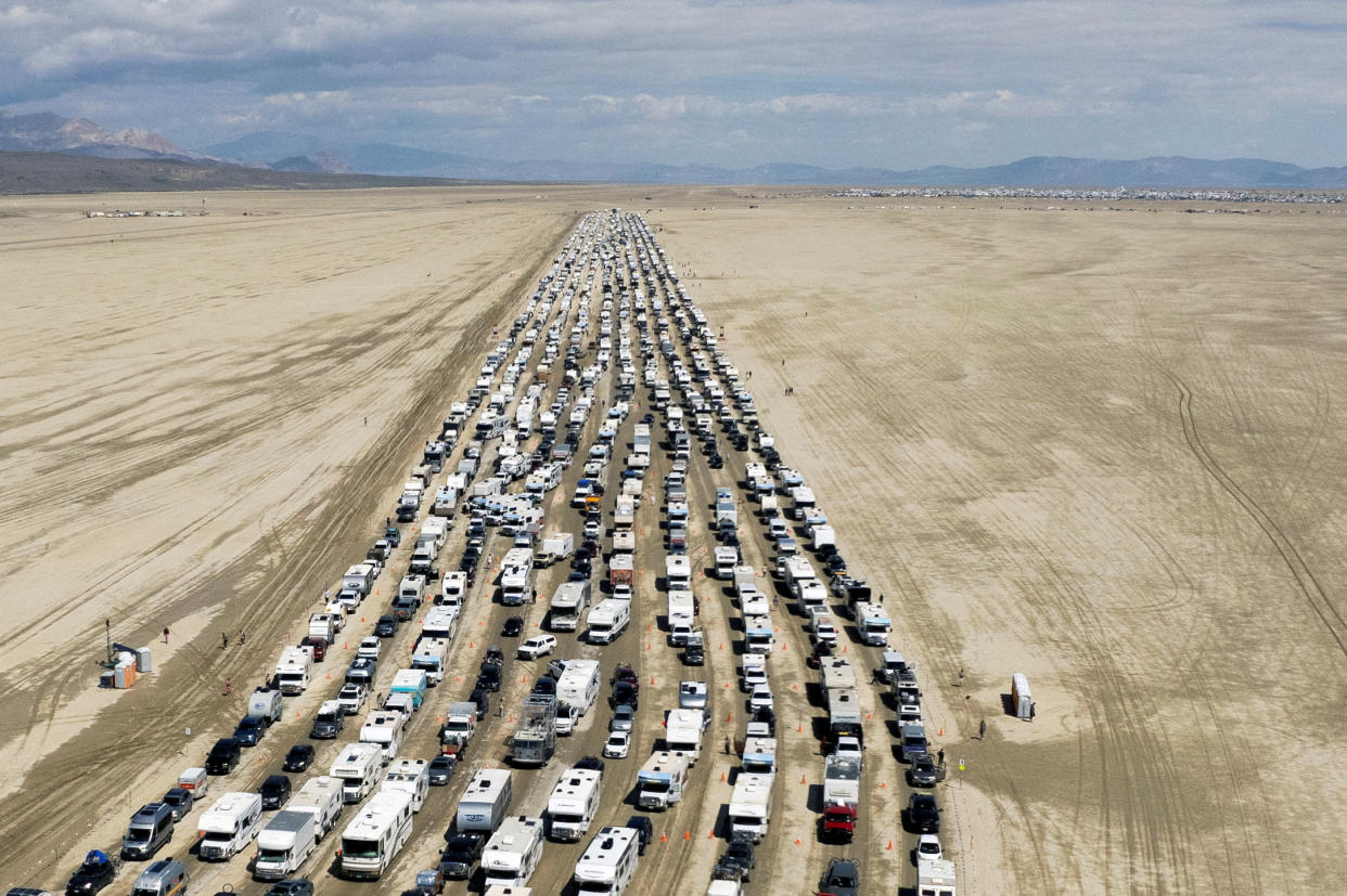 After the rain: Vehicles are seen departing the Burning Man festival in Black Rock City, Nevada, September 4, 2023. (Reuters/Matt Mills McKnight)     