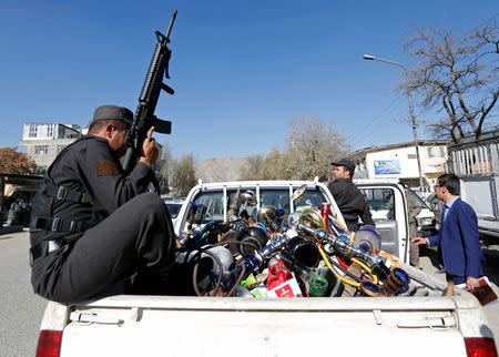 Water pipes are seen at the back of a police vehicle after being seized during a raid confiscating shisha water pipes in Kabul, Afghanistan November 27, 2016. REUTERS/Mohammad Ismail