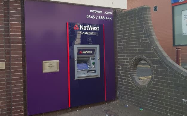 Hole in the wall, next to the hole in the wall - the NatWest Hole has achieved notoriety 