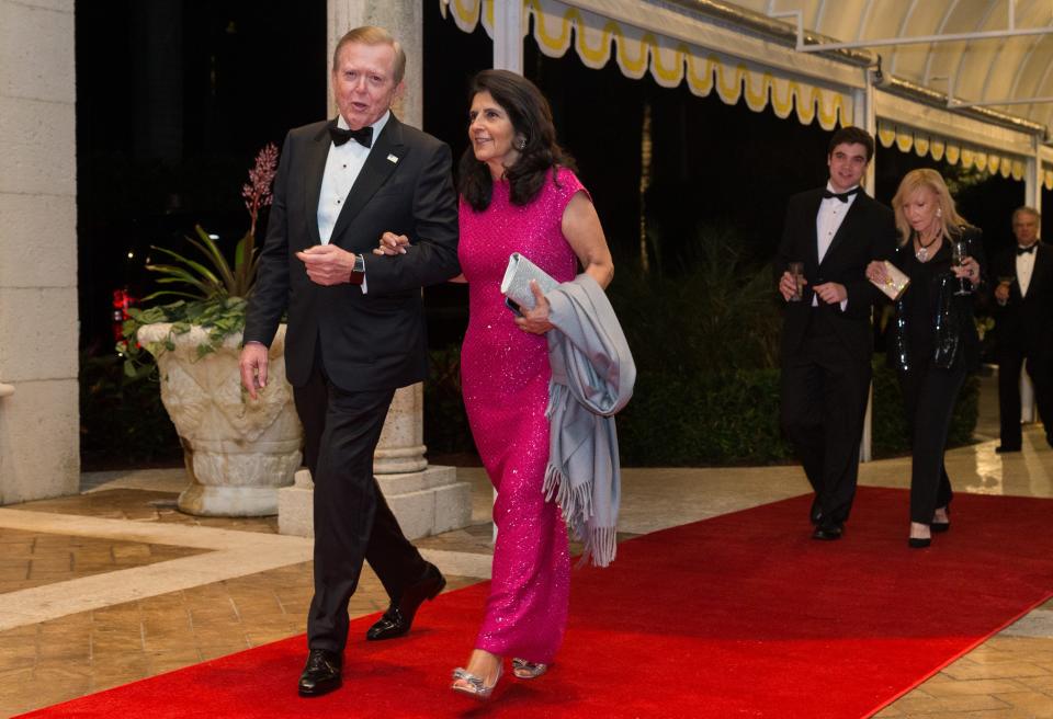 TV news celebrity Lou Dobbs, seen here with his wife Debi Lee Segura at Mar-a-Lago on New Year's Eve 2017, owns a large property in Wellington, where daughter Hillary has won awards as a show jumper.