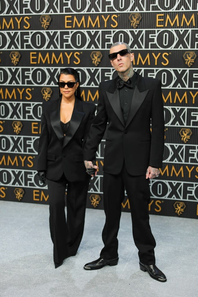 (L-R) Kourtney Kardashian and Travis Barker attend the 75th Primetime Emmy Awards at Peacock Theater on January 15, 2024 in Los Angeles, California.