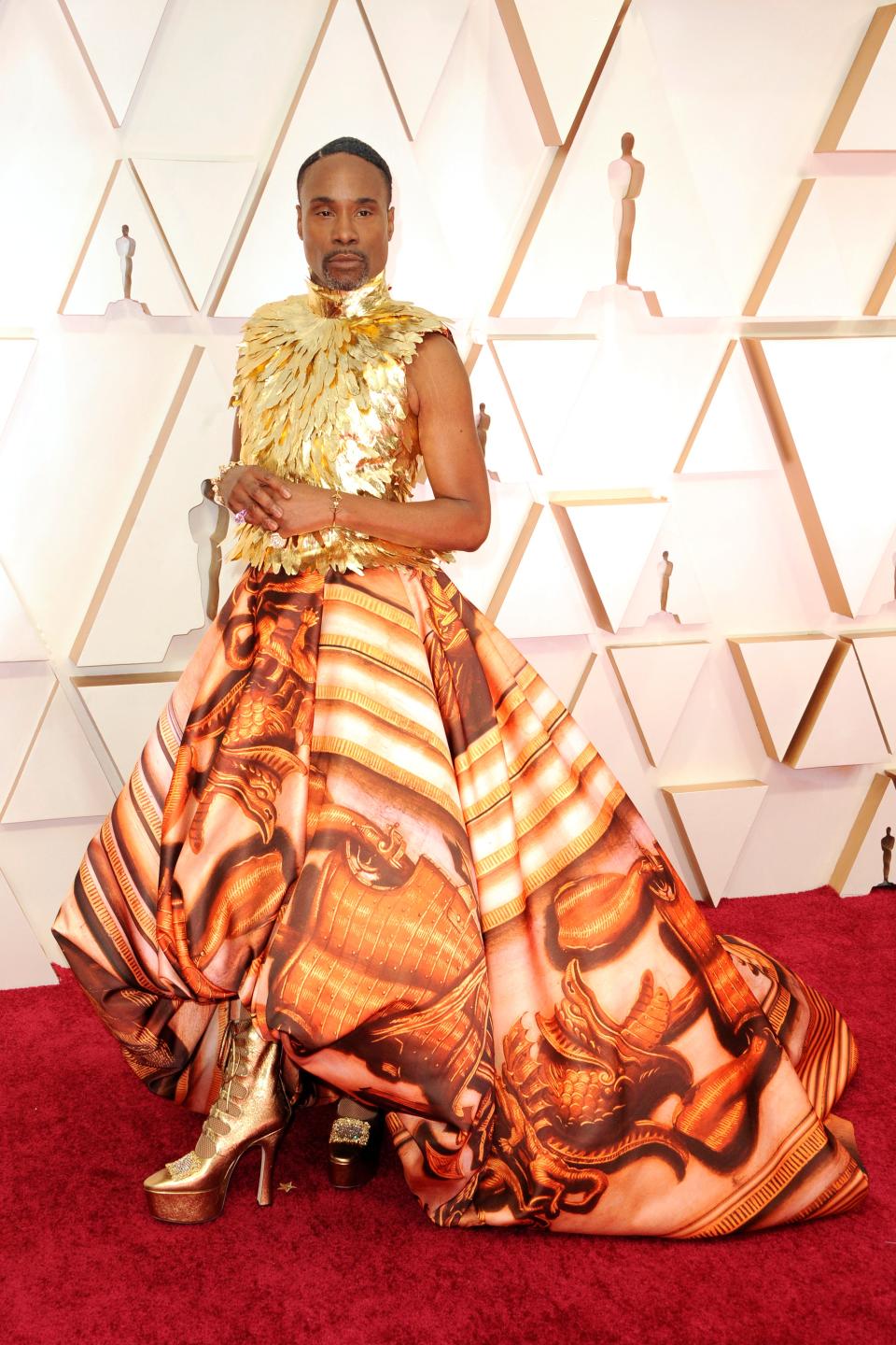 Billy Porter at the 2020 Oscars in gold and orange dress
