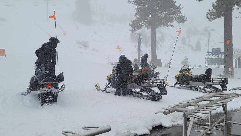 Rescues crews work at the scene of an avalanche at a California ski resort near Lake Tahoe on Wednesday, Jan. 10, 2024, in Calif. The avalanche roared through a section of expert trails at the resort, killing one person and injuring another, as a major storm with snow and gusty winds moved into the region, authorities said. (Mark Sponsler via AP)