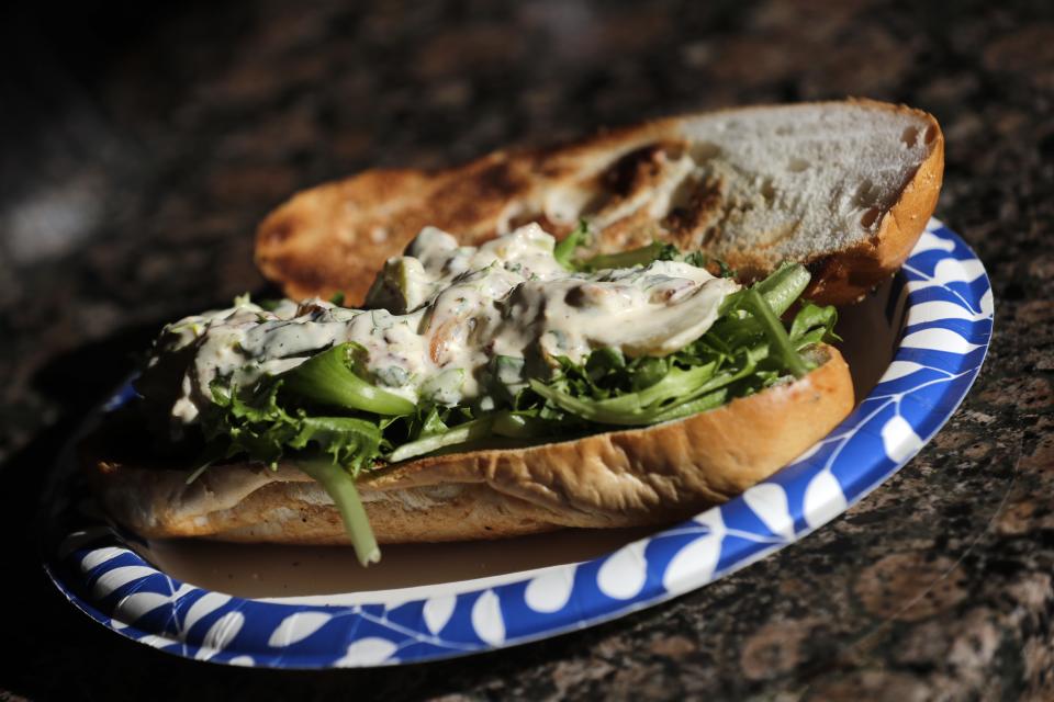 Served over lettuce on a hoagie roll, sturgeon is first fried in onions and butter then mixed with mayonnaise, Dijon mustard, lemon juice, Creole seasoning, dried mustard powder, celery, green onions and fresh parsley. Anthony Richter created this dish Monday, January 30, 2023, at his home in in Grand Chute, Wis.
(Photo: Dan Powers/USA TODAY NETWORK-Wis)