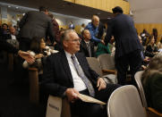 FILE - In this Nov. 18, 2019, file photo, Pacific Gas & Electric CEO Bill Johnson waits to appear before a state Senate oversight hearing of the Energy, Utilities and Communications committee, at the Capitol in Sacramento, Calif.An Associated Press review shows widespread problems with the four “public safety power shutoffs” the utility started rolling out in 2018, a year before massive blackouts paralyzed much of California in recent months. Interviews and documents obtained under public records requests reveal persistent failures and broken promises that in some cases compromised public safety. (AP Photo/Rich Pedroncelli, File)