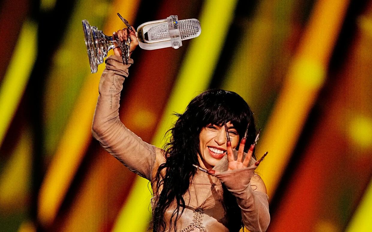 Sweden entrant Loreen with the trophy after winning the Eurovision Song Contest - PA