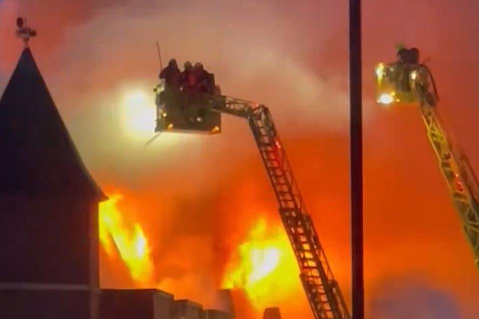 Handout photo taken with permission from the social media site X, formerly Twitter posted by Ridwan Ahmed of firefighters tacking a blaze at Forest Gate police station on Romford Road, east London (Ridwan Ahmed/PA) (PA Media)