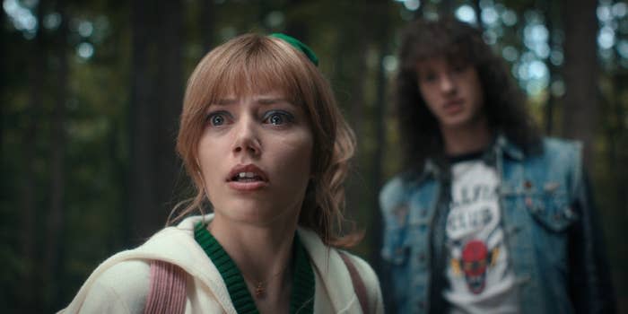 Chrissy in the woods with Eddy in "Stranger Things"