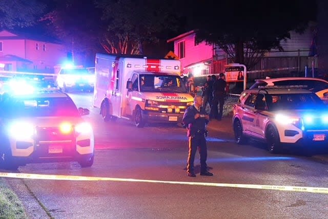 A large police presence was visible at the home at 76 Avenue and 142 Street on Friday night.