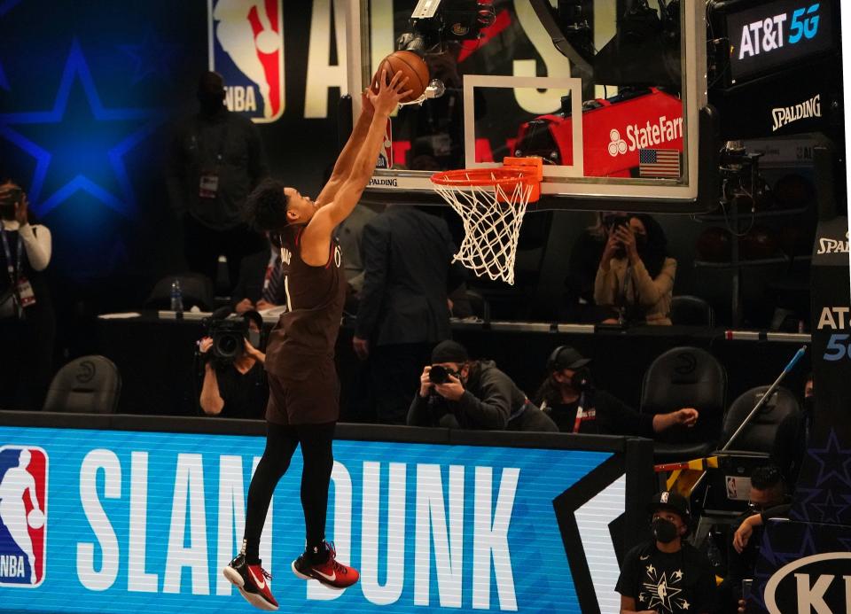 Anfernee Simons of the Portland Trail Blazers competes in the  AT&T Slam Dunk Contest