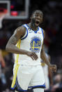 Golden State Warriors forward Draymond Green reacts after being called for a foul against the Portland Trail Blazers during the first half of an NBA basketball game in Portland, Ore., Wednesday, Feb. 8, 2023. (AP Photo/Craig Mitchelldyer)