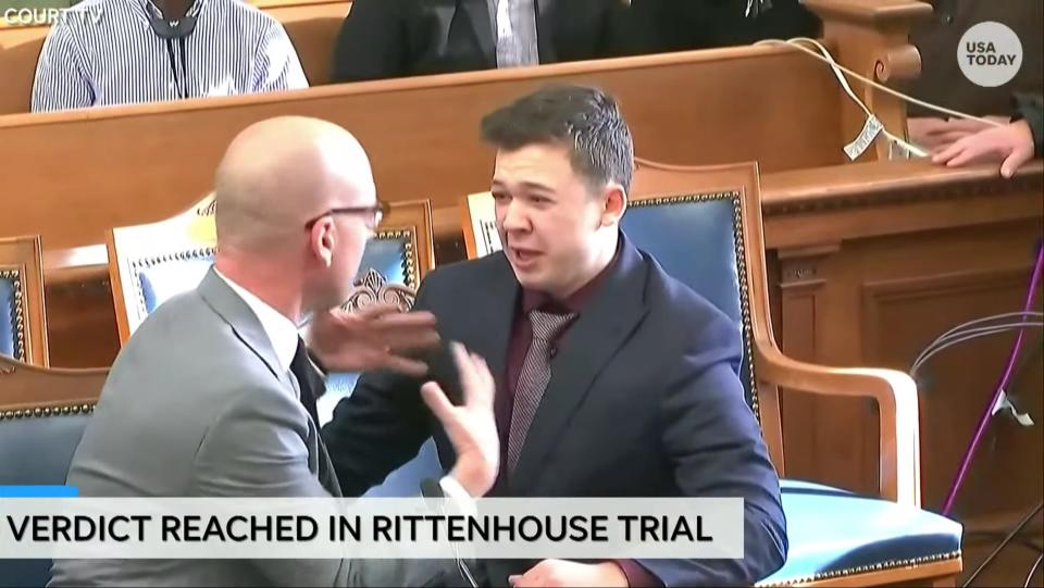 Defense attorney Corey Chirafisi hugs Kyle Rittenhouse after a verdict of not guilty is read in the trial of Kyle Rittenhouse in Kenosha, Wisc. on Nov. 19, 2021. Rittenhouse faced charges of first-degree intentional homicide, first-degree reckless homicide and attempted first-degree intentional homicide stemming from shootings during a violent night of protest over police brutality and racial justice in Kenosha, Wisconsin, in 2020.