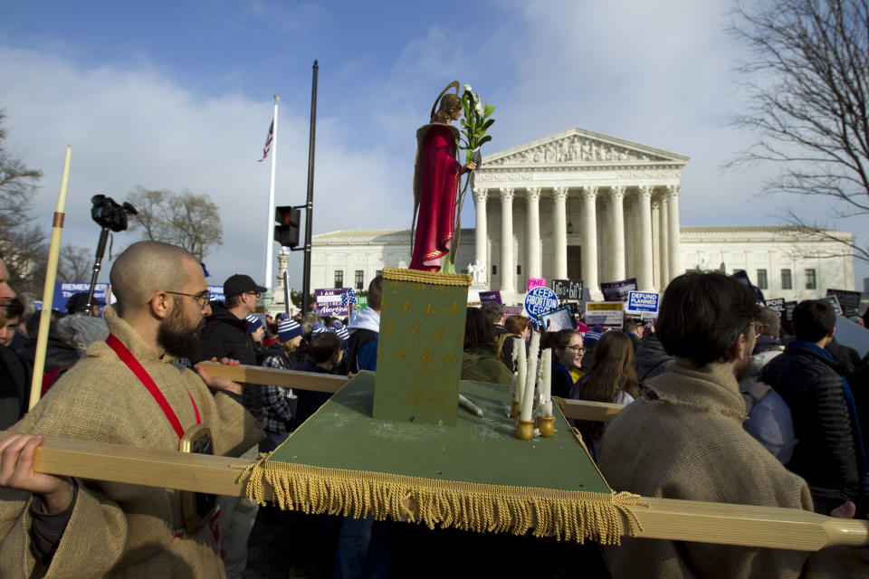 Anti-abortion activists march outside of the U.S. Supreme Court, during the March for Life in Washington Friday, Jan. 18, 2019. (AP Photo/Jose Luis Magana)