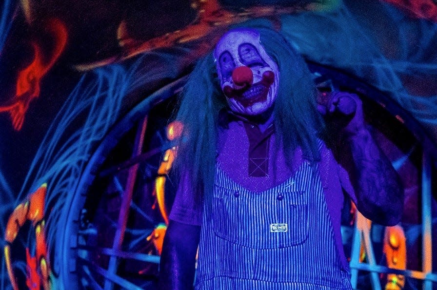 Pictured is a devilish clown from Reaper's Revenge in Blakely, a haunted attraction.