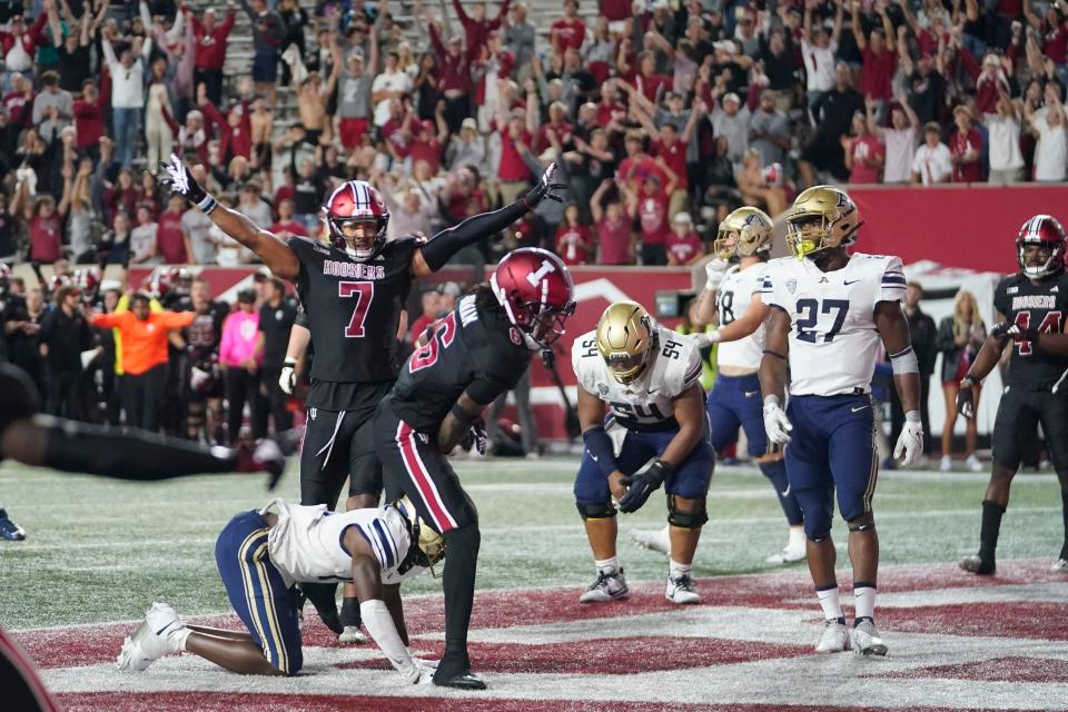 Indiana linebacker Jacob Mangum-Farrar (7) celebrates after his team defeated Akron in four overtimes, Saturday, Sept. 23, 2023, in Bloomington.