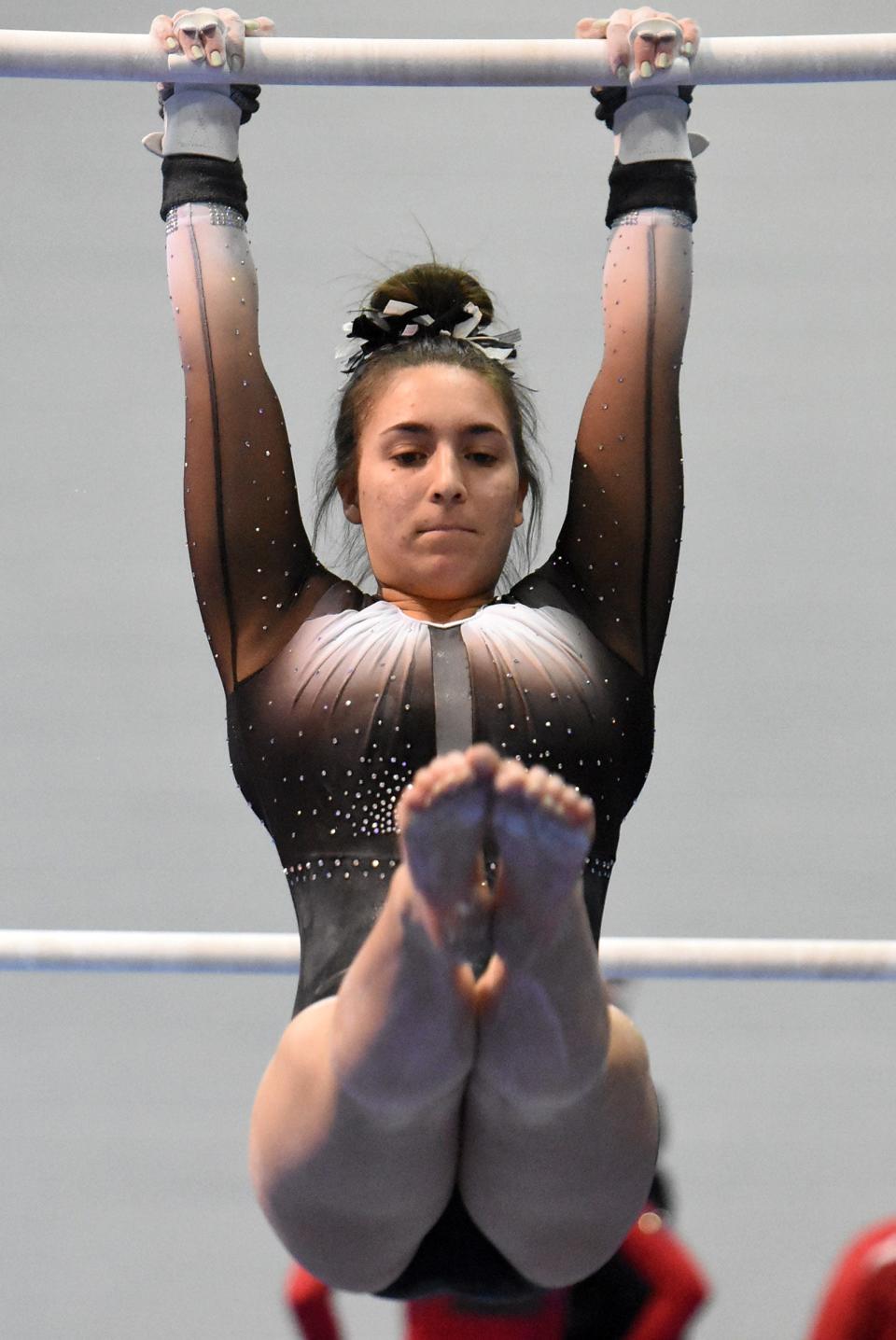 Howell's Maria Petru finished first all-around in a meet against Brighton, Hartland and Novi.