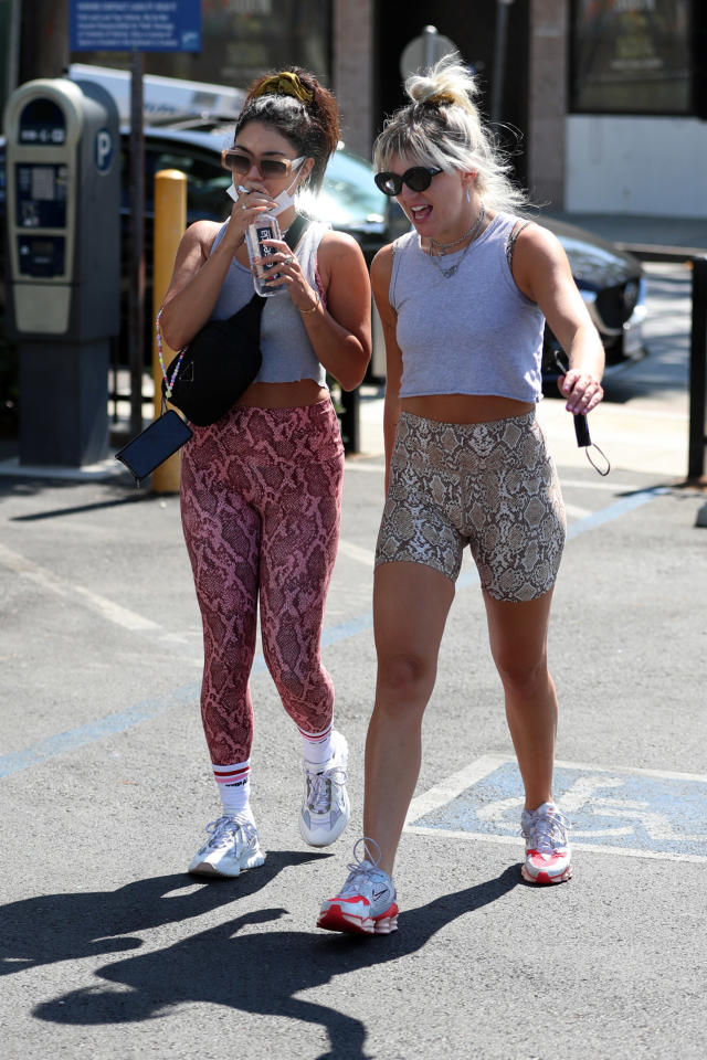 vanessa hudgens stands out in bright red workout top and leggings