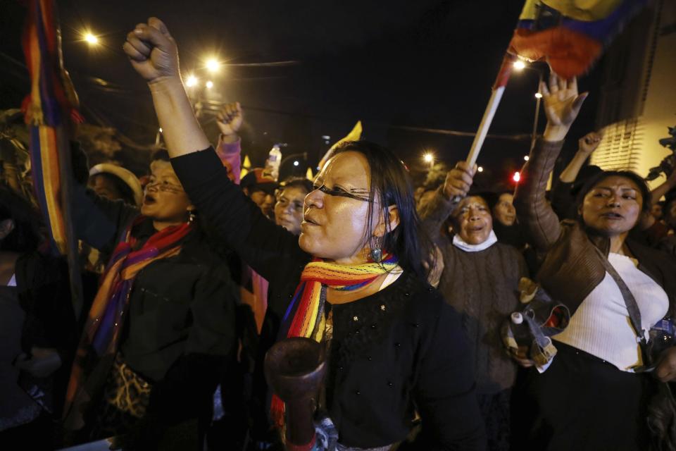 Indigenous protesters march through Quito, Ecuador, Thursday, Oct. 10, 2019. Big jumps in fuel prices after the government ended subsidies last week plunged Ecuador into upheaval, triggering protests, looting, vandalism, clashes with security forces, the blocking of highways and the suspension of parts of its vital oil industry. (AP Photo/Fernando Vergara)