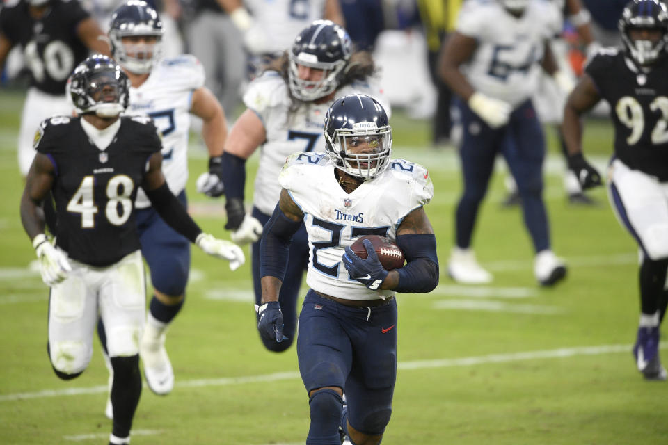 Tennessee Titans running back Derrick Henry (22) runs for a game-winning touchdown against the Baltimore Ravens during overtime of an NFL football game, Sunday, Nov. 22, 2020, in Baltimore. The Titans won 30-24 in overtime. (AP Photo/Nick Wass)