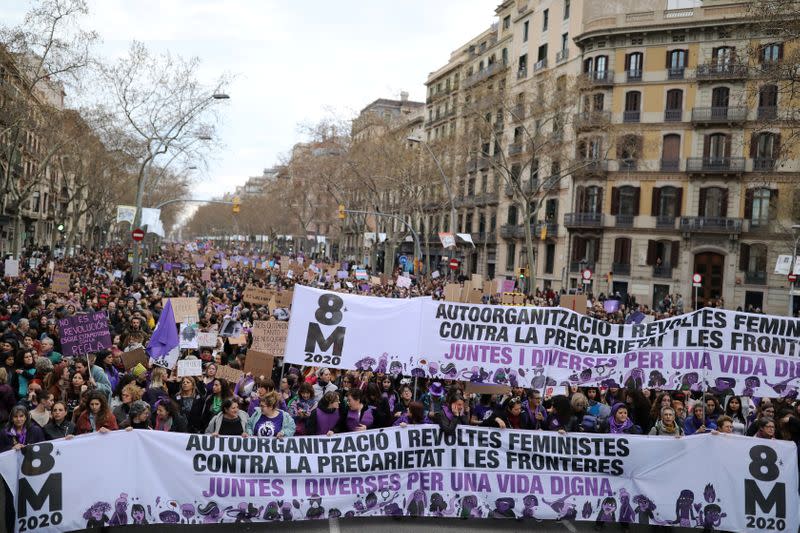 Women take part in a protest to mark the International Women's Day in Barcelona