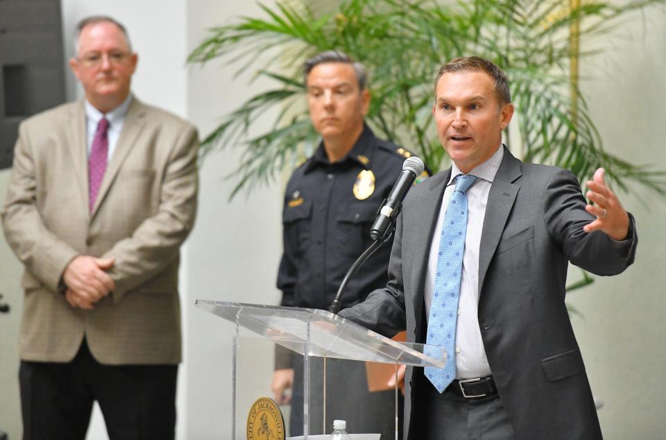 Jacksonville Mayor Lenny Curry (right), at a news conference last year outlining the logistics of the Florida-Georgia game with ASM Global general manager Bill McConnell (left) and JSO officer Brian Kee (center), has been an enthusiastic supporter of the game remaining in Jacksonville. Five candidates for his job are in agreement.