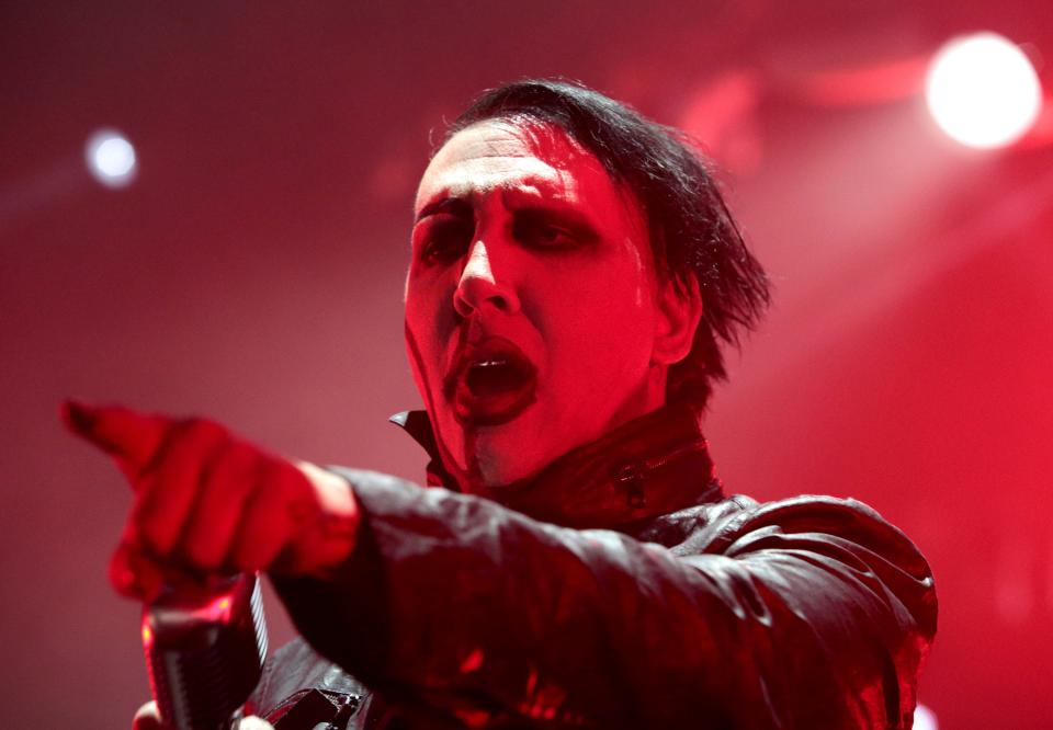 FILE - In this Aug. 2, 2015 file photo, Marilyn Manson performs in concert during the "End Times Tour 2015" at the Susquehanna Bank Center, in Camden, N.J. Manson's representative said Saturday, Sept. 30, 2017, that the singer was injured in a mishap on stage during a New York City performance and taken to a hospital. (Photo by Owen Sweeney/Invision/AP, File) ORG XMIT: NYET701